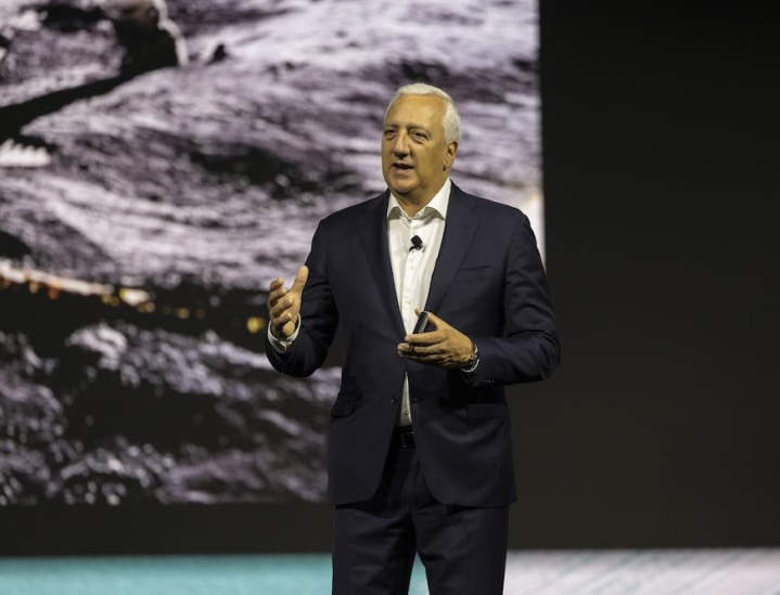 Mike Massimino speaking on stage.